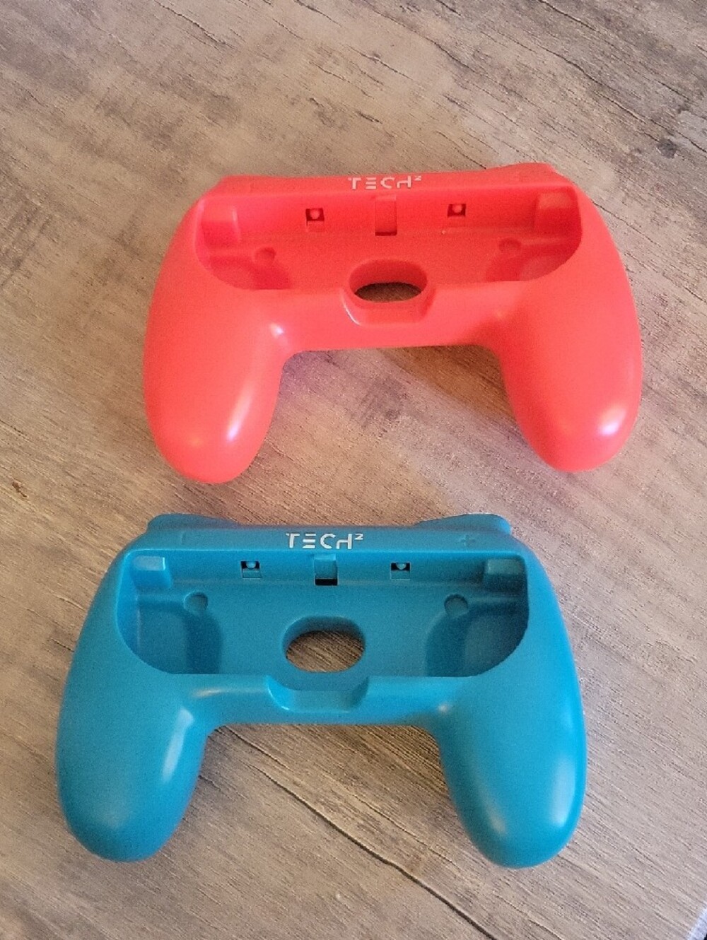 Red and Teal Wireless Controller Grips